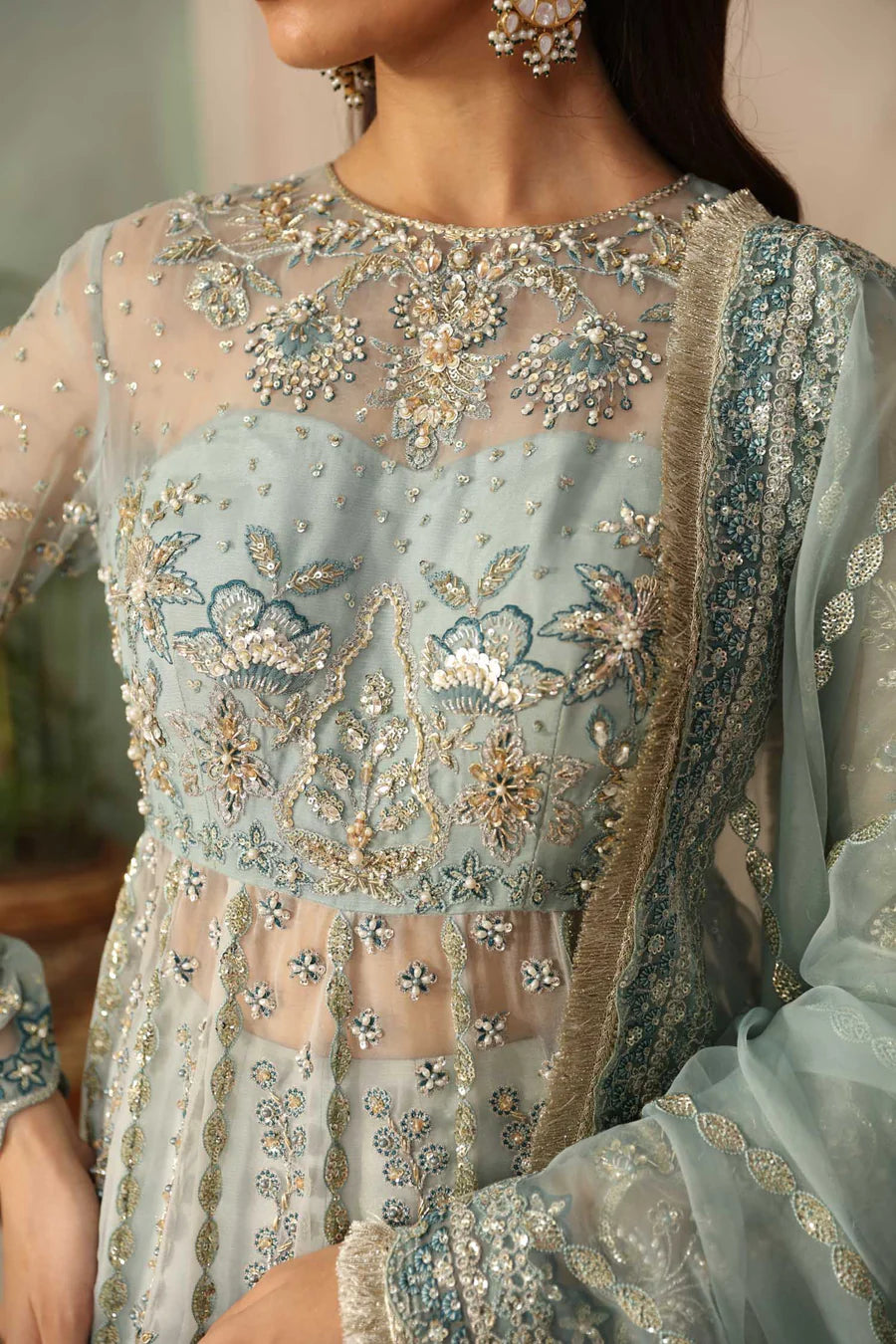 Shop AKBAR ASLAM MASTANI '25 LUXURY FORMALS FROSTINE at Raz Ruya! Huge discounts on luxury Pakistani designer wear. Fast delivery to UK, USA & Canada. End-of-Year & New Year Sale!