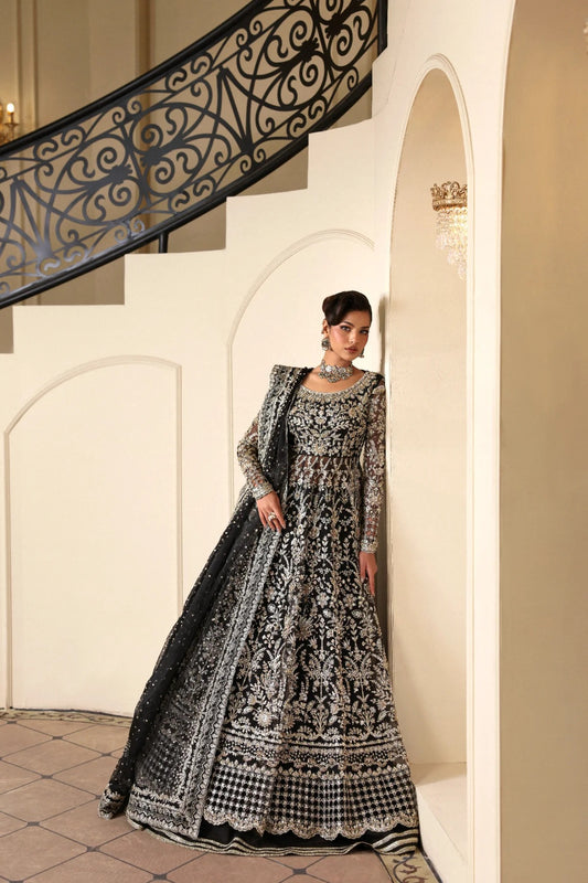 Stunning hand-embellished organza outfit with detailed panels, matching dupatta, Russian grip inner, and raw silk lehenga fabric. Ideal for formal occasions.