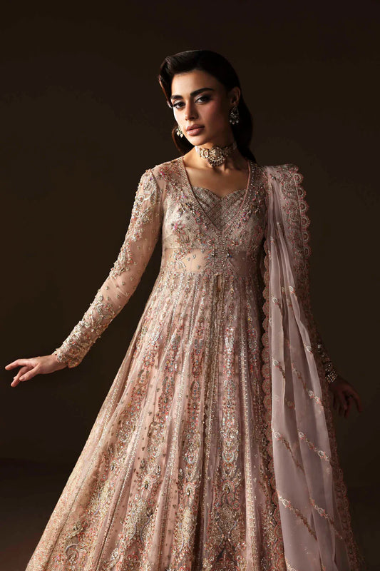 Shop organza embroidered lehenga with hand embellished blouse, panels & dupatta. Includes raw silk lehenga & lining—perfect for weddings & events.