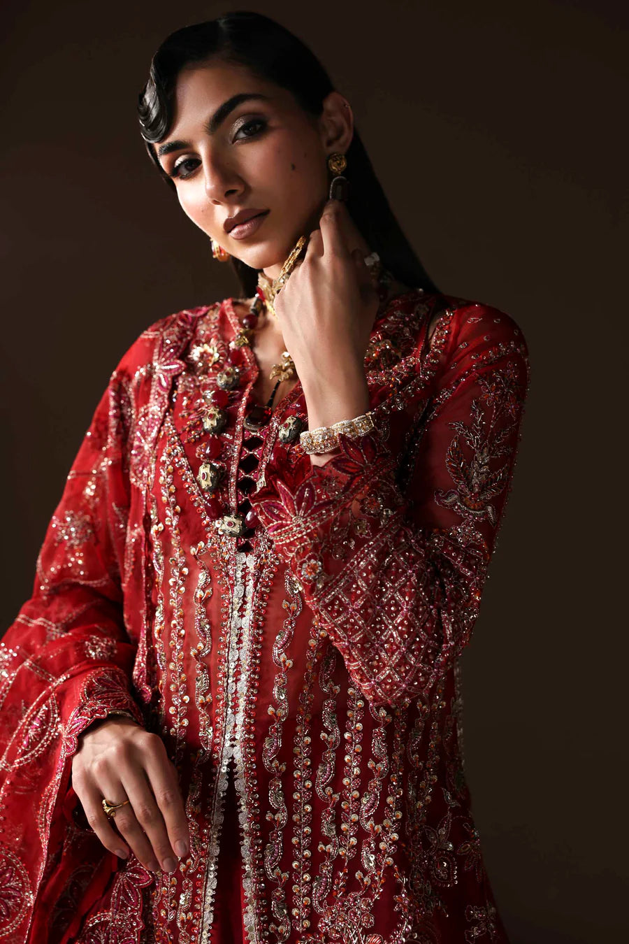 Shop organza embroidered lehenga dress with hand embellishments & dupatta. Includes raw silk lehenga & inner—perfect for weddings & festive wear.