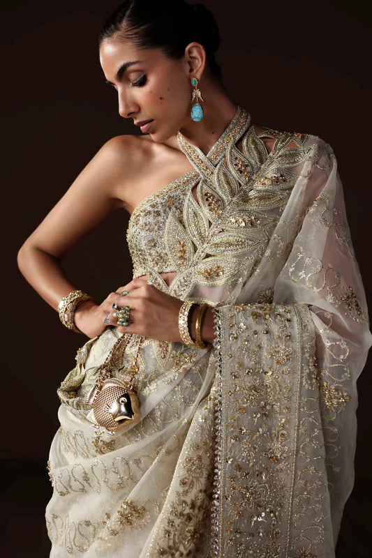Shop luxury organza embroidered saree with hand embellished blouse, pallu & borders. Includes raw silk inner—perfect for weddings & festive wear.