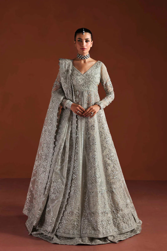 Shop luxury organza embroidered lehenga with hand embellished blouse, panels & dupatta. Includes raw silk lehenga & lining—perfect for weddings.