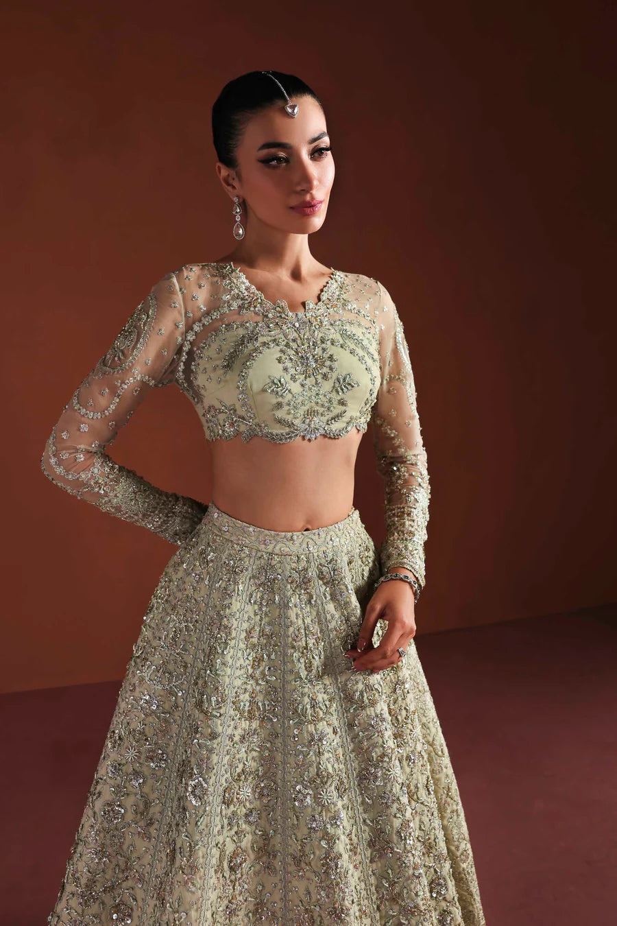 Shop organza embroidered dress with hand embellished panels, belt & dupatta. Includes inner—perfect for weddings, parties & festive wear.