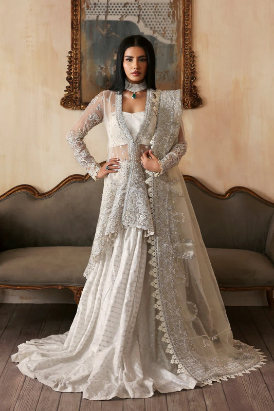 Luxurious handmade organza suit featuring embroidered front, back, and sleeves panels, paired with an elegant dupatta and zari jacquard trousers—perfect for festive occasions.