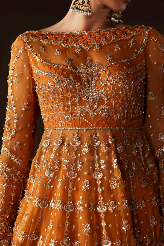 Shop organza embroidered lehenga with hand embellished blouse, panels & dupatta. Includes raw silk lining—perfect for weddings & festive wear.