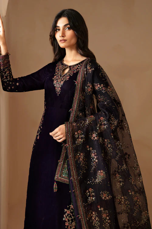 Pure velvet dress with intricate embroidery, digital printed organza dupatta, and raw silk bottom. A perfect choice for a refined and luxurious formal look.