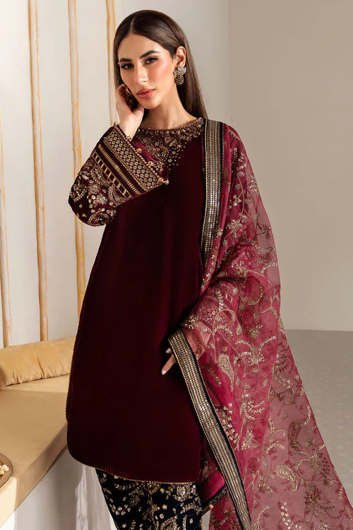 Pure velvet dress with intricate embroidery and organza dupatta, crafted for timeless elegance and luxury — perfect for formal gatherings and events.