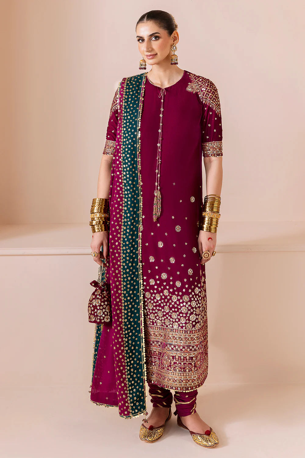 Luxurious CVF D-02 velvet suit with rich embroidery, georgette chiffon dupatta & dyed raw silk bottom. Perfect blend of comfort and elegance for formal events.