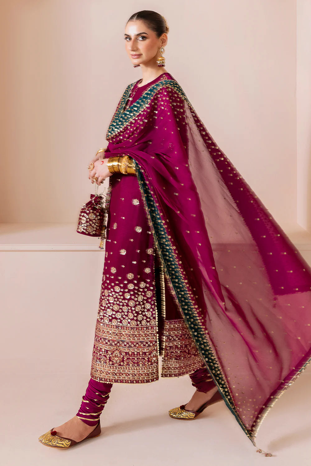 Luxurious CVF D-02 velvet suit with rich embroidery, georgette chiffon dupatta & dyed raw silk bottom. Perfect blend of comfort and elegance for formal events.