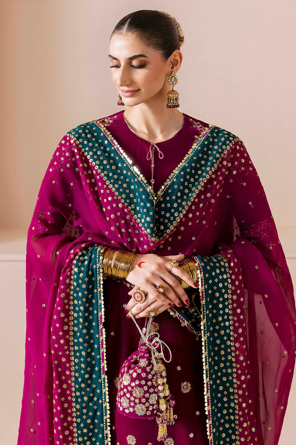 Luxurious CVF D-02 velvet suit with rich embroidery, georgette chiffon dupatta & dyed raw silk bottom. Perfect blend of comfort and elegance for formal events.