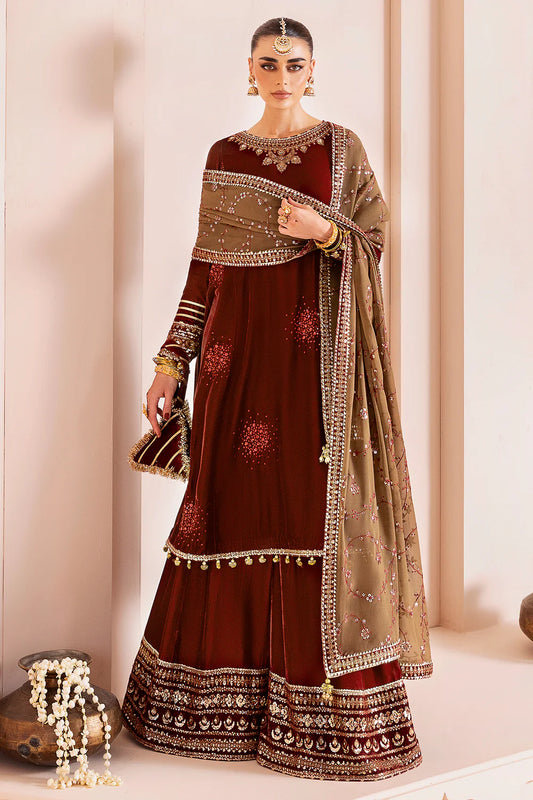 Luxurious pure velvet suit with intricate embroidery on panels, sleeves & borders. Includes embroidered georgette chiffon dupatta for a refined formal look.