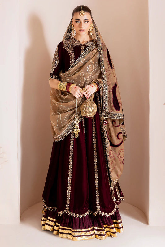 Luxurious velvet formal dress with intricate embroidery, organza dupatta, and silk crushed bottom. A timeless unstitched outfit for elegant evening wear.