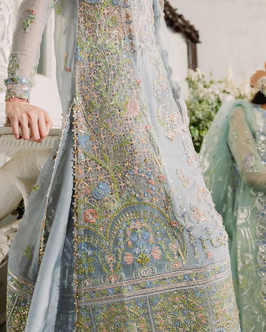 Shop this ice blue chiffon suit with pearl & sequin work, sequinned net dupatta, foil silk trouser & handcrafted tassels. Perfect for festive & formal occasions!