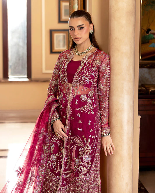 Elegant wedding formal featuring hand-embroidered sequined organza shirt, raw silk lehenga, sequined dupatta, and exquisite lace & tassel finishes.
