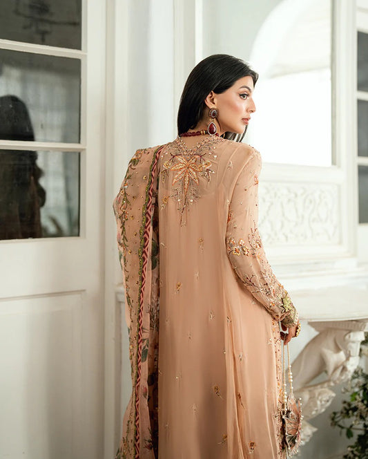 Elegant mocha chiffon suit with handwork, 3D florals, printed organza dupatta & foil silk trouser. Finished with tassels, lace & pearl detailing. Shop now!