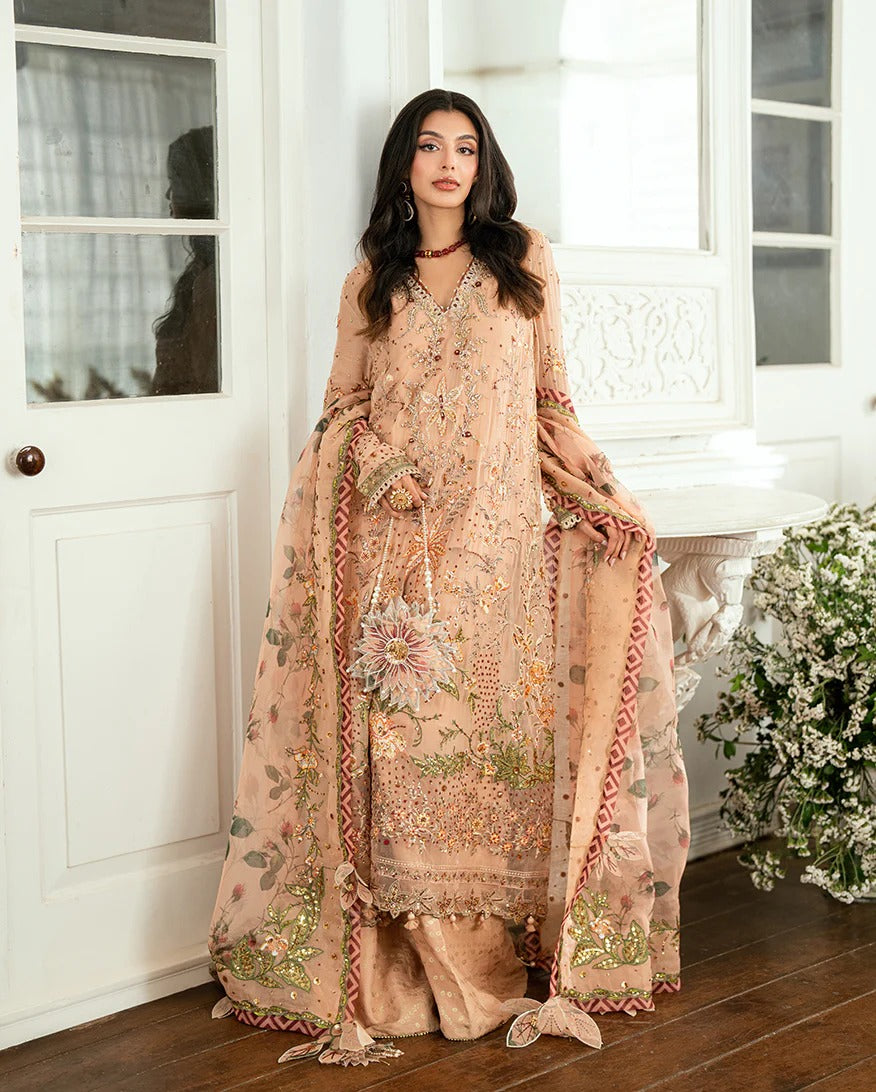 Elegant mocha chiffon suit with handwork, 3D florals, printed organza dupatta & foil silk trouser. Finished with tassels, lace & pearl detailing. Shop now!