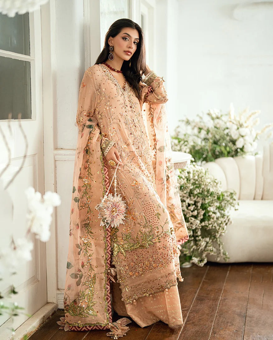 Elegant mocha chiffon suit with handwork, 3D florals, printed organza dupatta & foil silk trouser. Finished with tassels, lace & pearl detailing. Shop now!