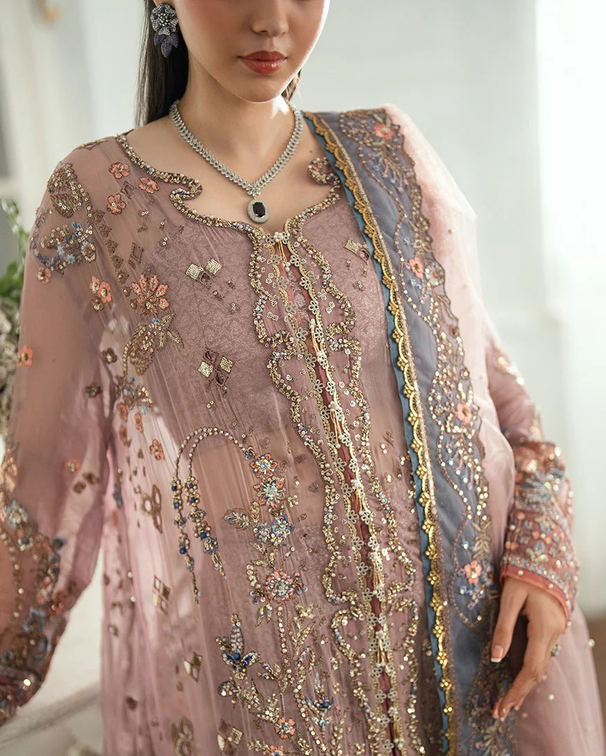 Luxury chiffon lehenga outfit with hand embellishments, sequins & pearl-detailed net dupatta. Includes jamawar lehenga & handcrafted tassels. Shop now!