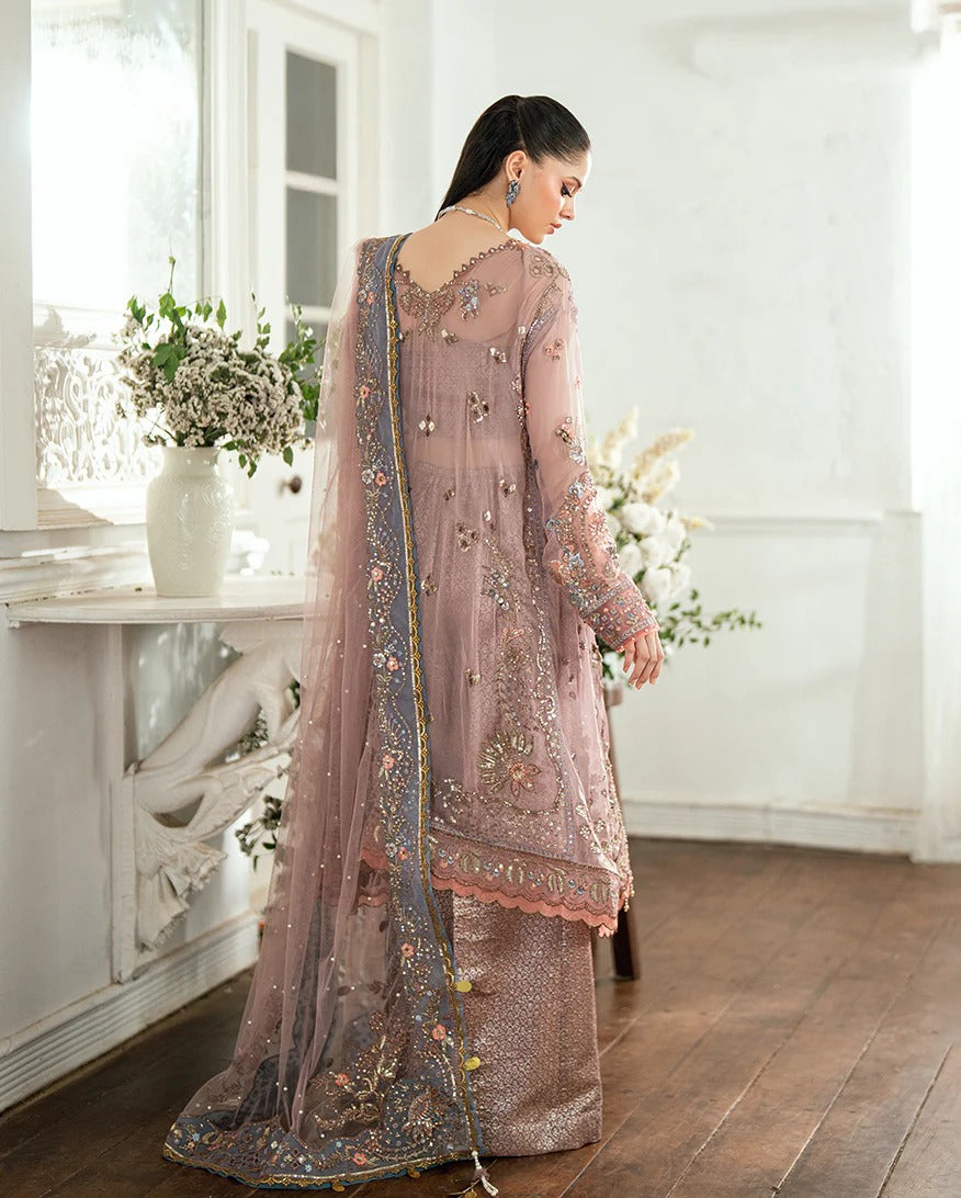 Luxury chiffon lehenga outfit with hand embellishments, sequins & pearl-detailed net dupatta. Includes jamawar lehenga & handcrafted tassels. Shop now!