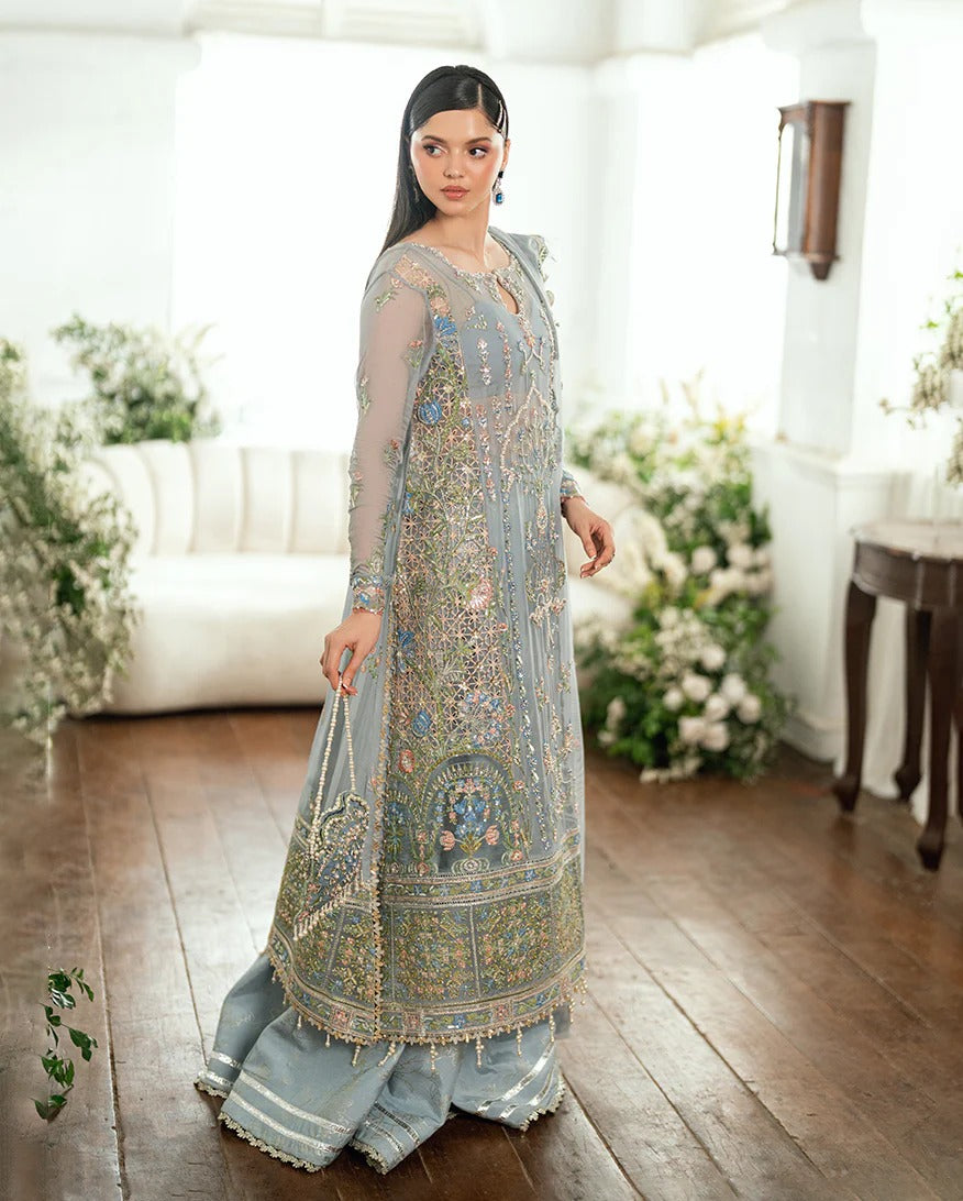 Shop this ice blue chiffon suit with pearl & sequin work, sequinned net dupatta, foil silk trouser & handcrafted tassels. Perfect for festive & formal occasions!
