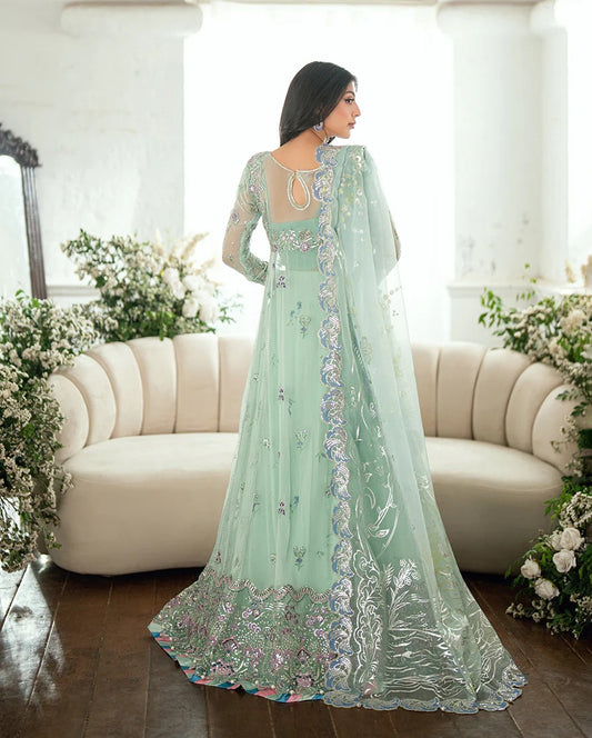 Elegant aqua chiffon suit with printed panels, sequinned organza borders, foil dupatta & raw silk trouser or jamawar lehenga. Finished with pearls & lace.