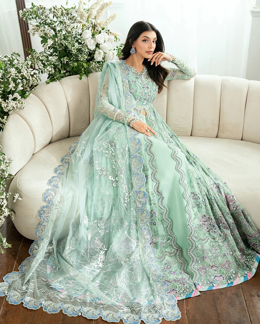 Elegant aqua chiffon suit with printed panels, sequinned organza borders, foil dupatta & raw silk trouser or jamawar lehenga. Finished with pearls & lace.