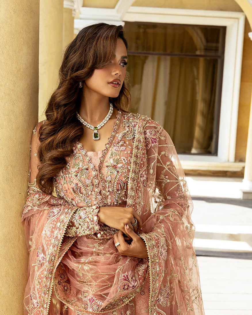 Elegant wedding formal featuring hand-embroidered sequined net shirt, organza borders, sequined dupatta, and luxurious dyed jamawar lehenga with golden lace finishes.