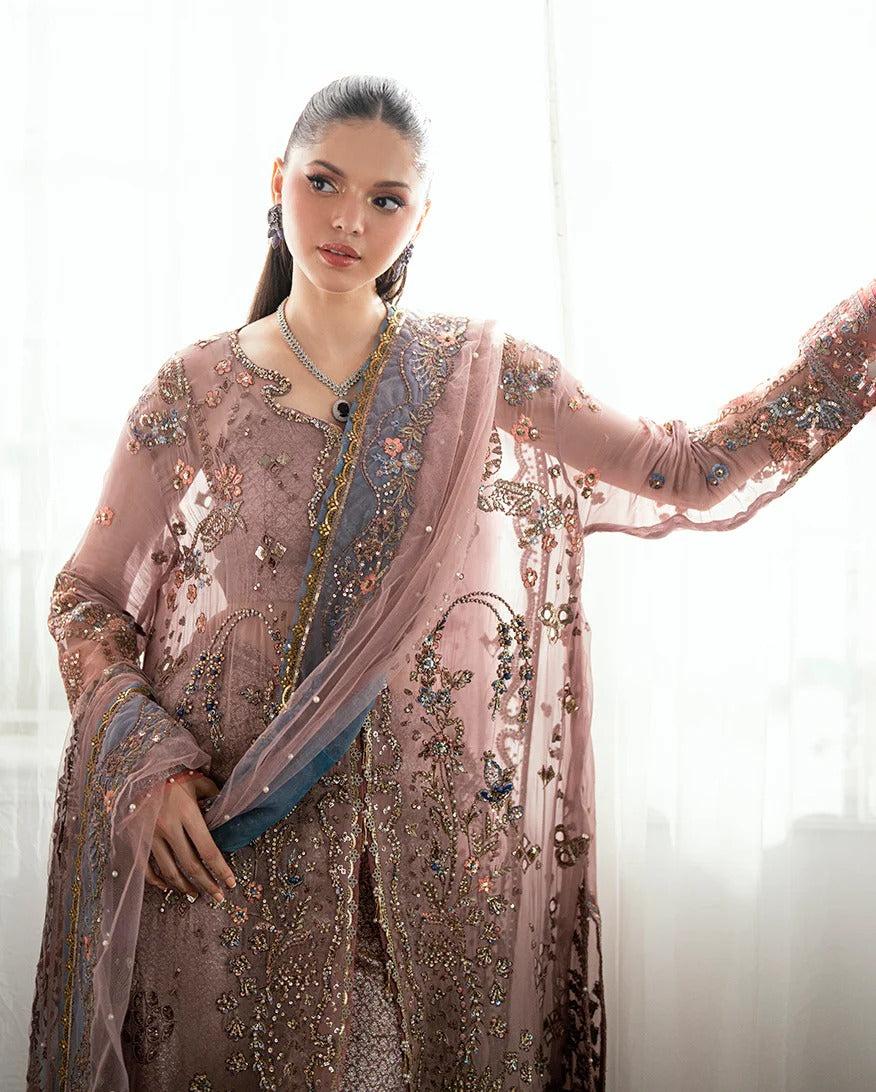 Luxury chiffon lehenga outfit with hand embellishments, sequins & pearl-detailed net dupatta. Includes jamawar lehenga & handcrafted tassels. Shop now!