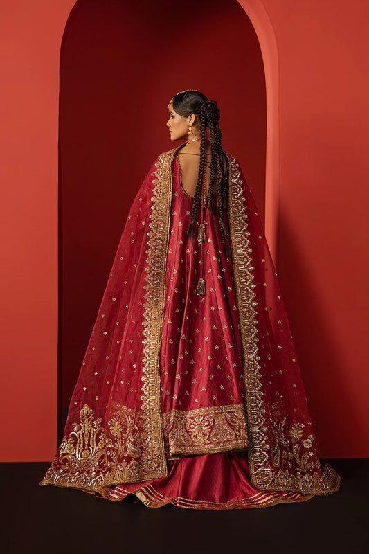 Stunning coral red raw silk suit with digital printed embroidery, elegant front and back panels, and a matching organza dupatta—ideal for festive and formal occasions.