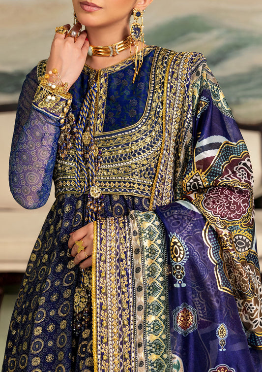 Elegant printed chiffon dress with embroidered silk bodice patches, organza borders and sleeves. Paired with medium silk pants and foil printed silk dupatta.