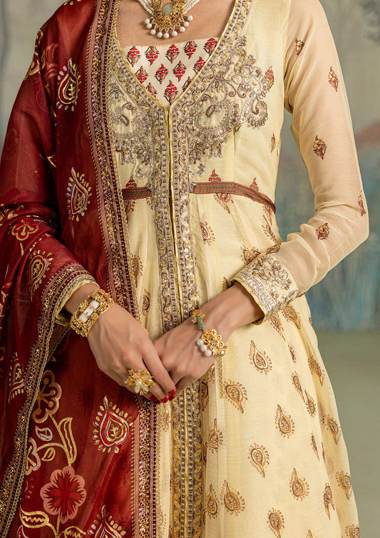 Stylish foil printed chiffon dress with embroidered organza neckline and borders. Paired with printed crepe silk pants and foil printed silk dupatta.