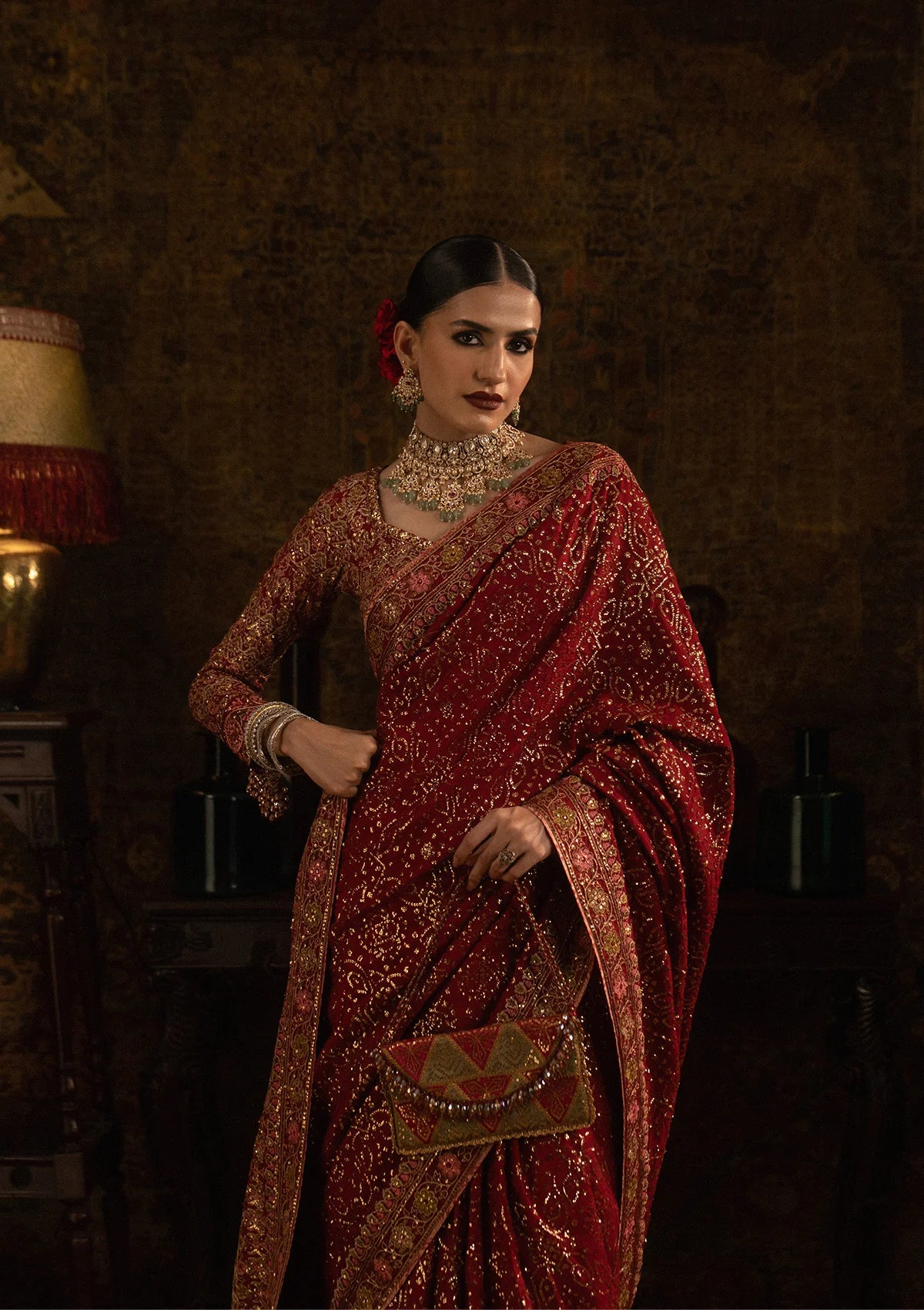 Elegant medium silk saree with embroidered fall, pallu and organza borders, paired with a medium silk blouse featuring embroidered bodice, sleeves and refined detailing.