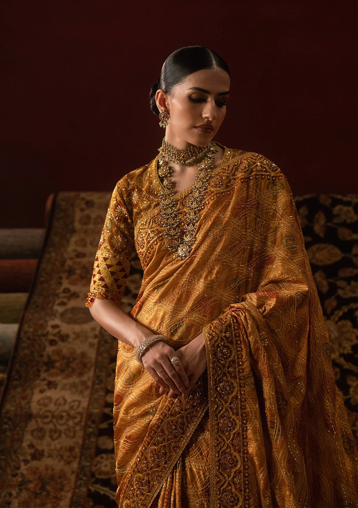 Elegant medium silk blouse with embroidered bodice and sleeves, paired with printed and embroidered tussar silk saree featuring pallu, borders, and medium silk petticoat.