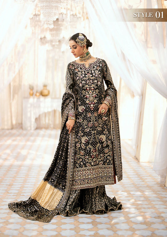 Luxurious medium silk ensemble with intricate embroidery, embellished borders, jamawaar pants, and an embroidered silk dupatta. Styled as a long shirt with gharara or izhaar pants for timeless elegance.