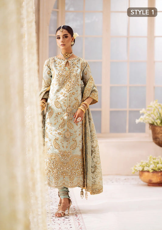 Graceful tissue ensemble with hand embellishments, hem patches, organza borders, masoori silk pants, and an embroidered tissue dupatta. Styled as a Hyderabadi shirt with churi pyjama or a long shirt with crushed sharara.