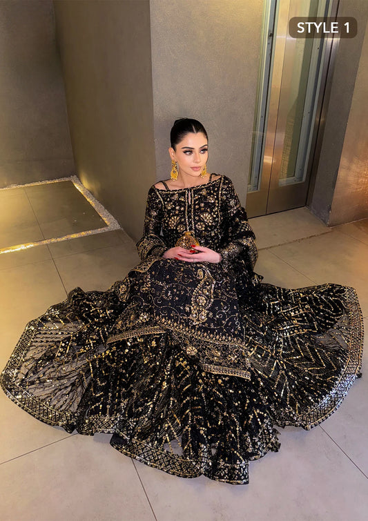 Elegant khaadi net ensemble with embellished organza borders, masoori silk pants, and chiffon dupatta. Styled as long shirt with gharara or crushed frock style.