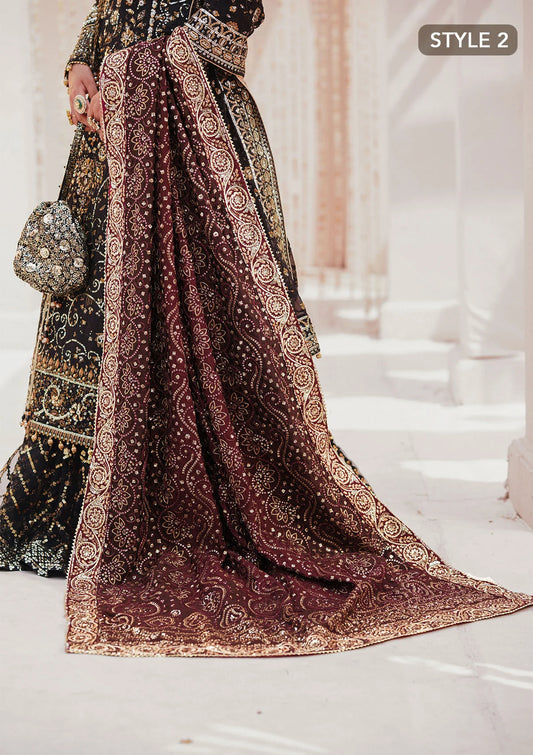 Luxurious maroon tussar silk shawl featuring a rich three-toned ruby base with elegant bandhni patterns, offering refined craftsmanship and festive appeal.