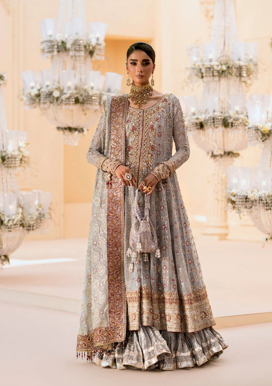 Graceful embroidered chiffon ensemble with organza neckline, silk and organza borders, jamawaar pants, and a chiffon dupatta. Styled as kalidar open front or angrakha sharara.
