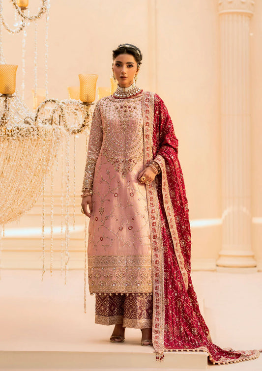 Elegant tissue ensemble with rich embroidery, embellished borders, jamawaar pants, and a silk dupatta. Styled as a long shirt with gharara or izaar pants.