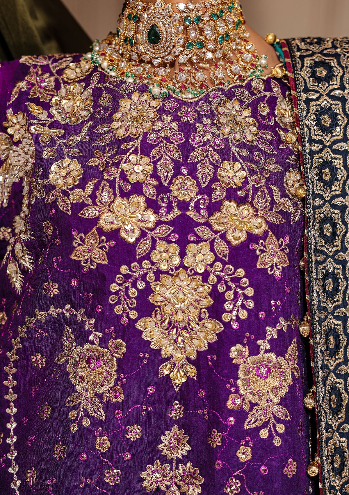 Elegant purple medium silk dress with embellished embroidery, organza borders and sleeves. Paired with masoori silk pants and embroidered silk dupatta.