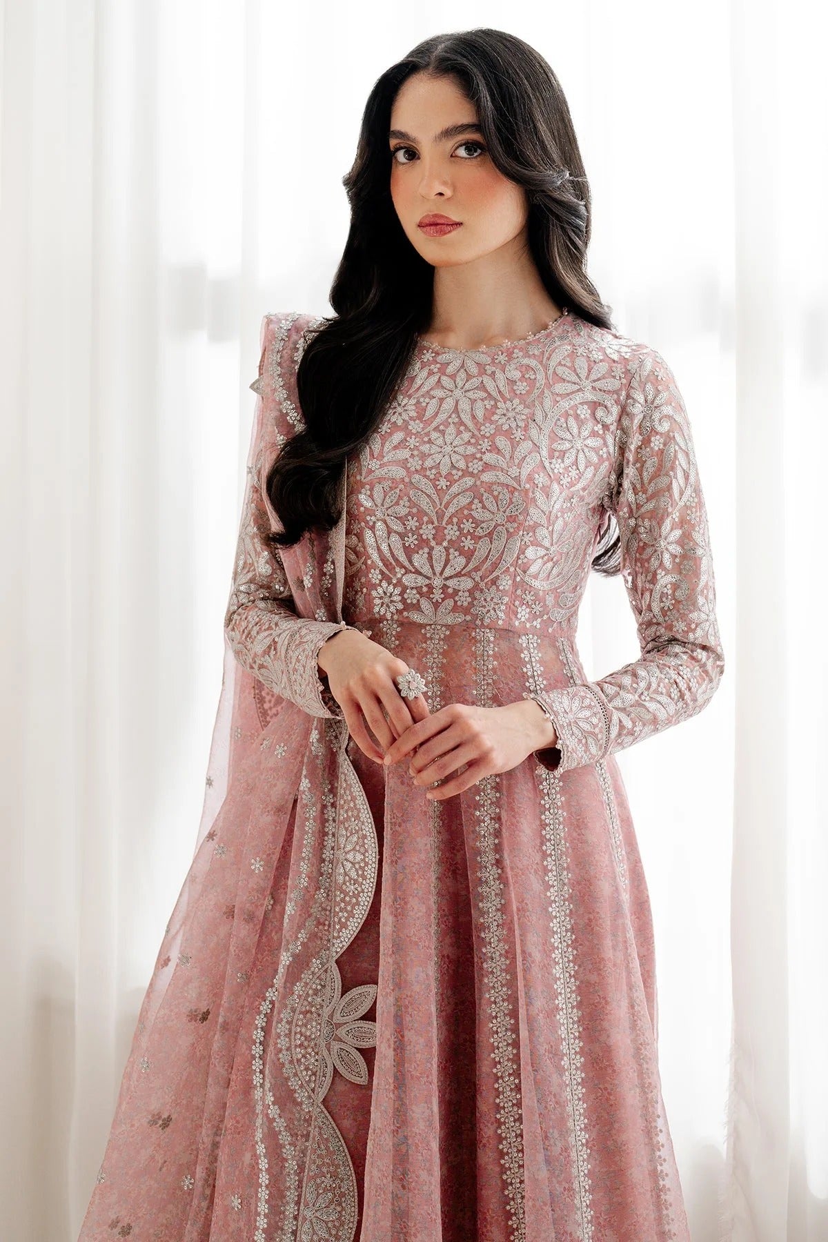 Upgrade your wardrobe with UC-3079 — a digitally printed, embroidered chiffon suit with rawsilk bottom. A perfect blend of elegance and style. Shop now!