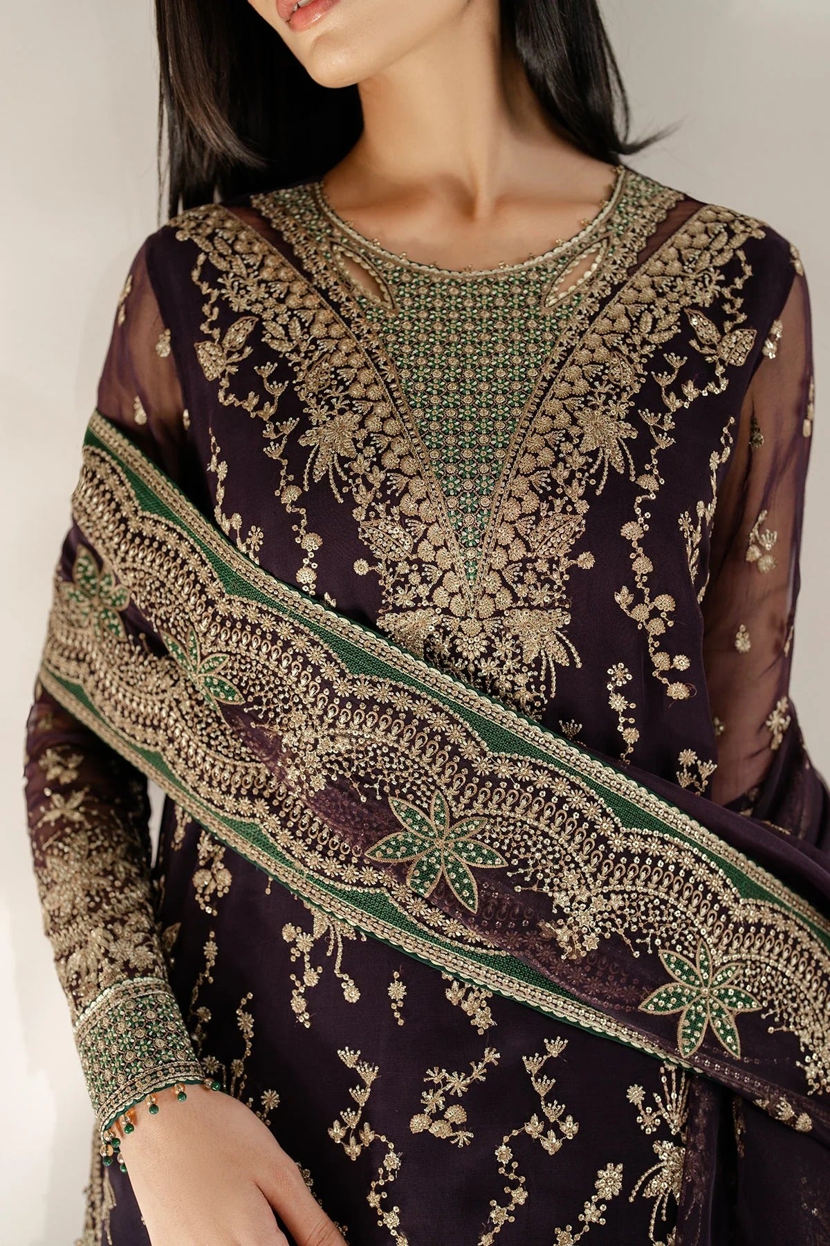 UC-3078 features intricate embroidery, organza dupatta, and rawsilk bottom—crafted for timeless elegance. Perfect for festive, party, or formal occasions.