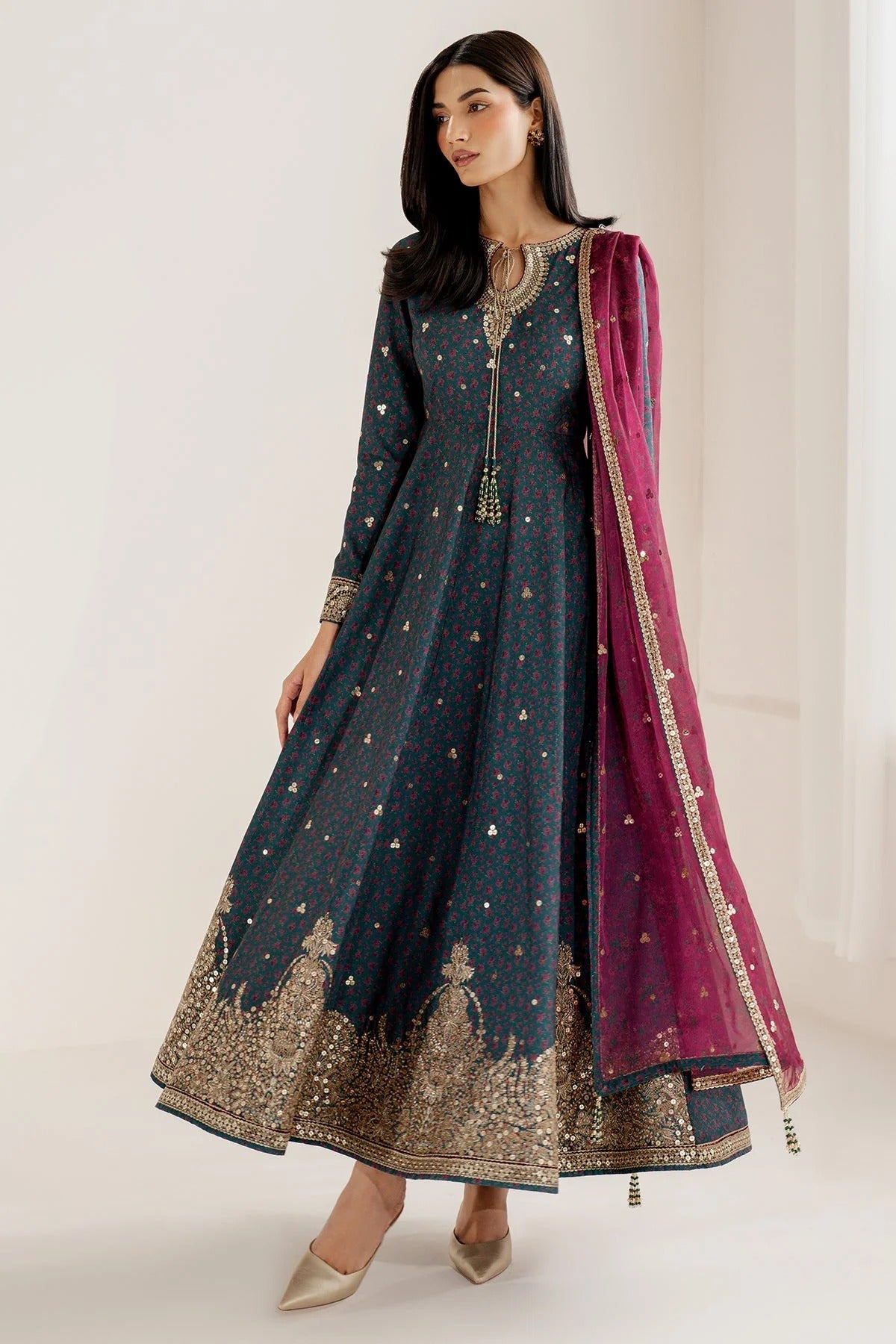 Discover UR-7058: a premium embroidered raw silk suit with chiffon dupatta and elegant borders. Perfect for formal, festive, or party occasions. Shop now!