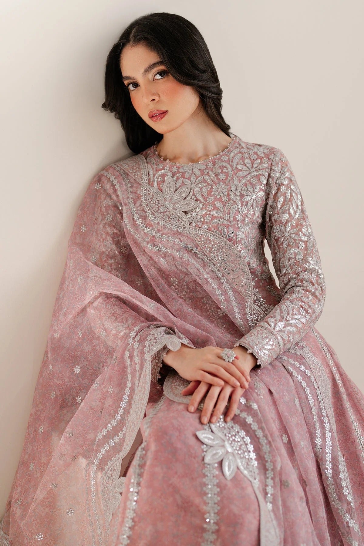 Upgrade your wardrobe with UC-3079 — a digitally printed, embroidered chiffon suit with rawsilk bottom. A perfect blend of elegance and style. Shop now!