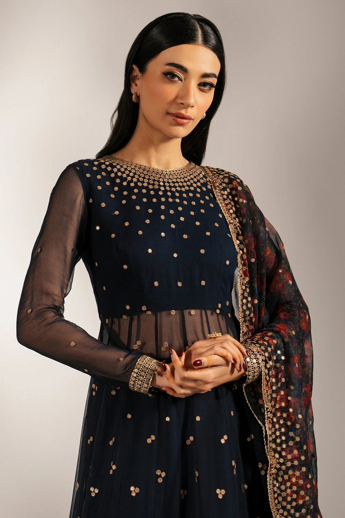 Intricately embroidered chiffon with digital print dupatta & rawsilk bottom—perfect for formal occasions. A luxurious look in every detail. Shop UC-3073 now!
