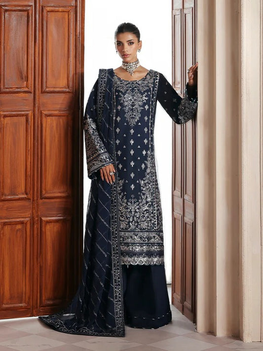 Stunning raw silk sharara dress with hand-embroidered and sequined panels, chiffon dupatta, and organza borders—crafted for luxury festive and bridal wear.