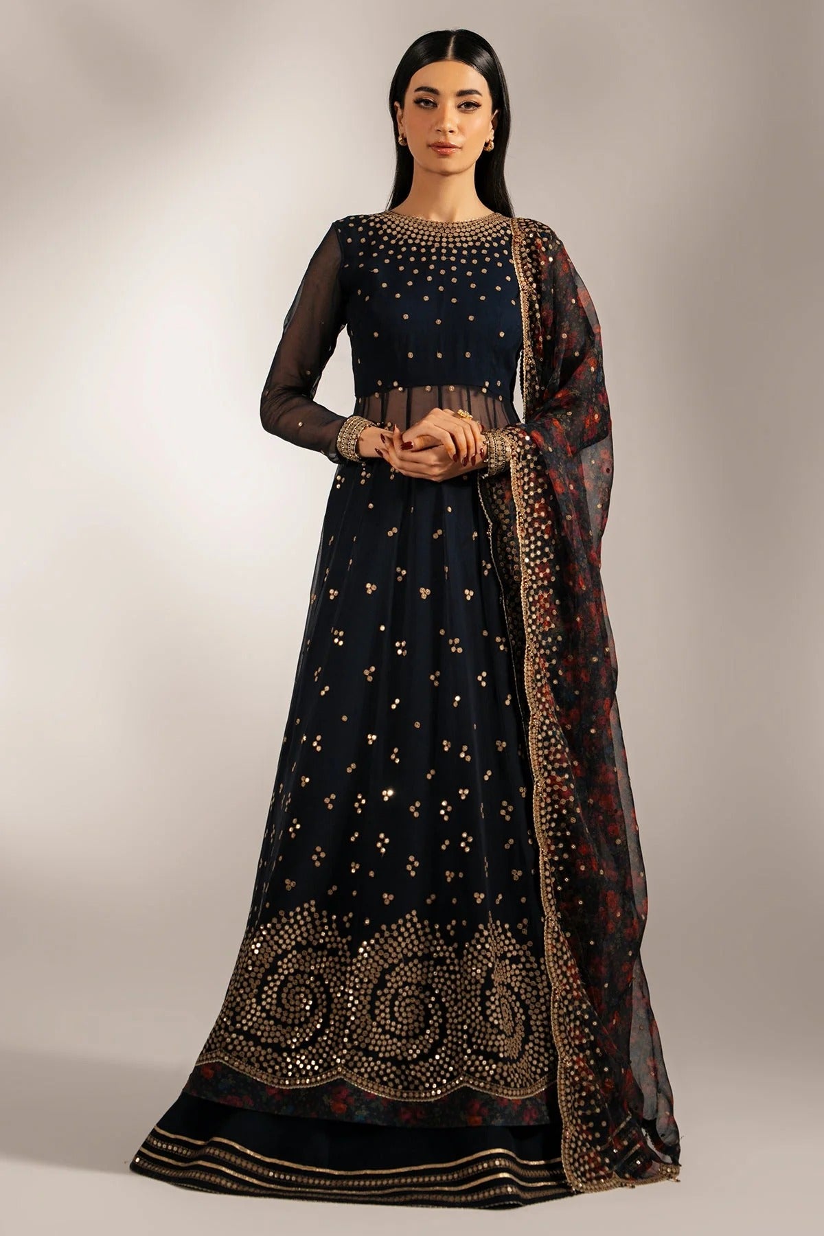 Intricately embroidered chiffon with digital print dupatta & rawsilk bottom—perfect for formal occasions. A luxurious look in every detail. Shop UC-3073 now!