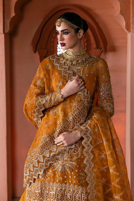Stunning organza lehenga with hand-embellished front, sleeves, dupatta & pallu, paired with raw silk inner—perfect for a graceful, regal look.