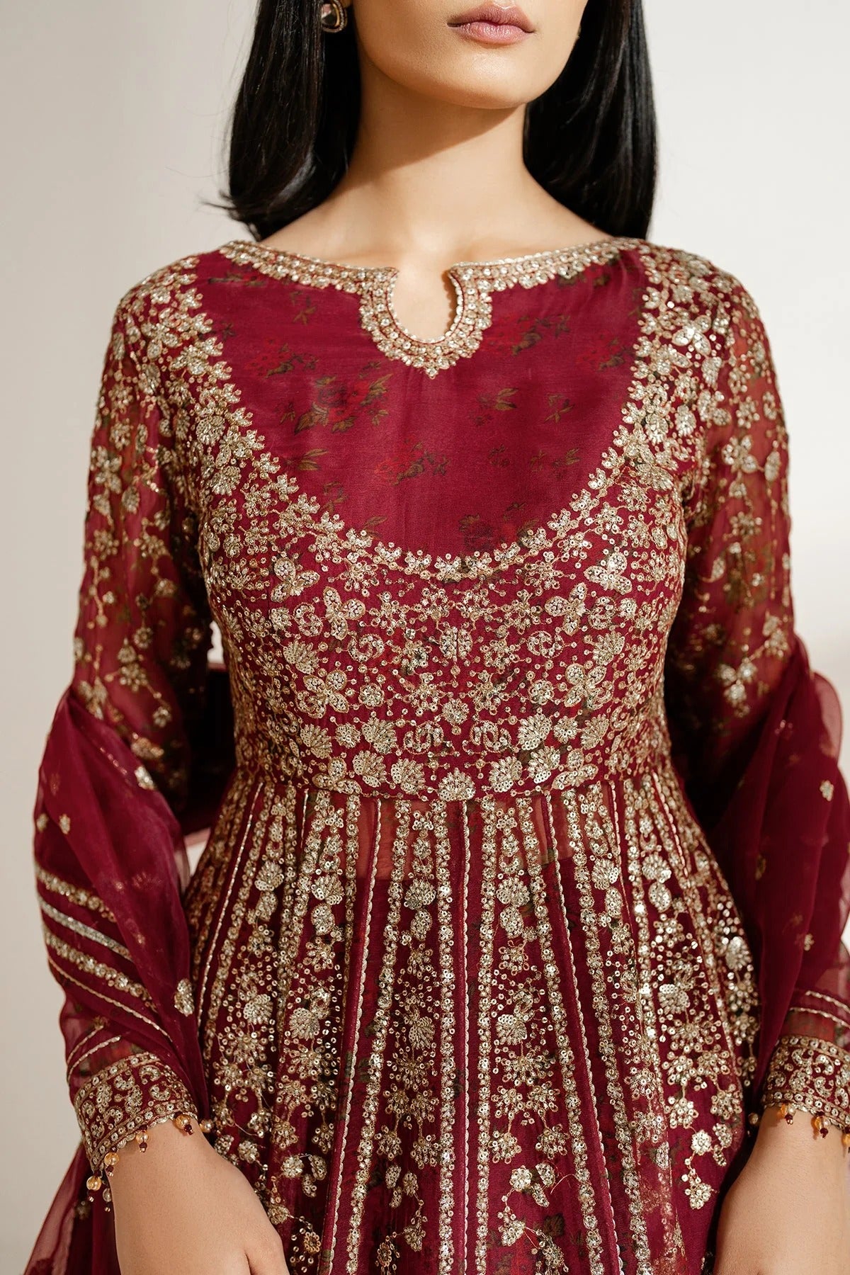 Embrace elegance with digital printed chiffon, organza dupatta, and rawsilk bottom. UC-3080 is perfect for formal events, festive wear, or special occasions.