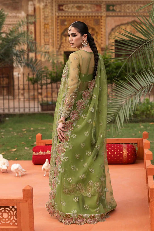Premium organza suit with hand-embellished front, borders, dupatta, sleeves & raw silk trouser—crafted for elegance, style, and timeless charm.